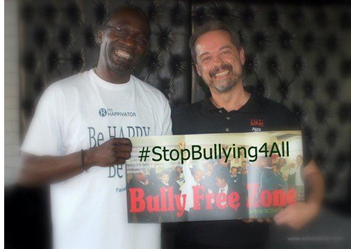 Photo of Dr Andy Hickson with Mr Happyvator promoting anti-bullying
